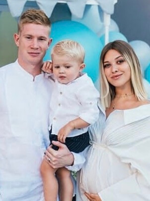 Mason with his parents.